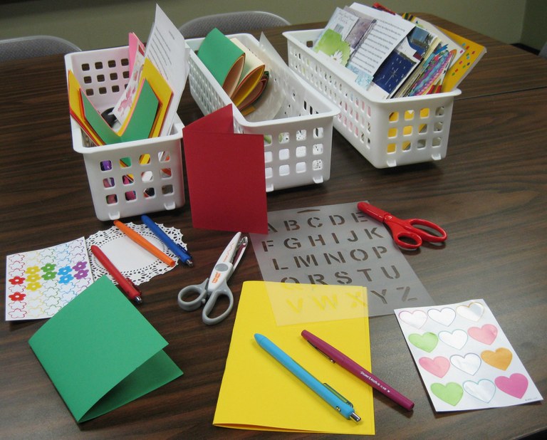 Crafting supplies are displayed on a table.